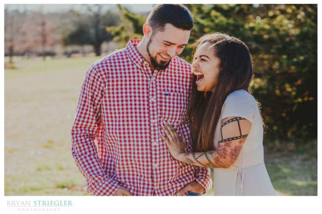 couple laughing during engagement session